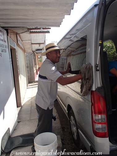 Humberto washing the van