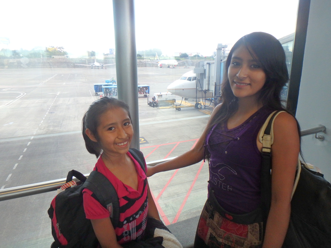 Aracely and Vanesa preparing to board their first ever flight