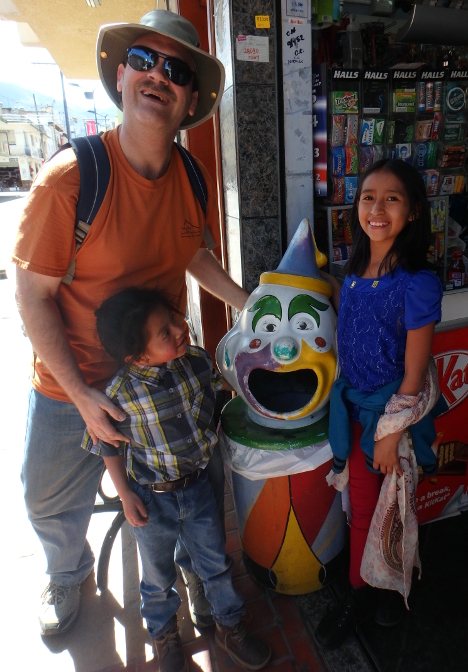 Craig, Yupanqui, and Aracely in front of a clown trash barrel that gave me flashbacks to Whalom Park