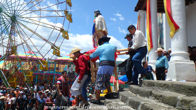 Effigies are carried down the church steps