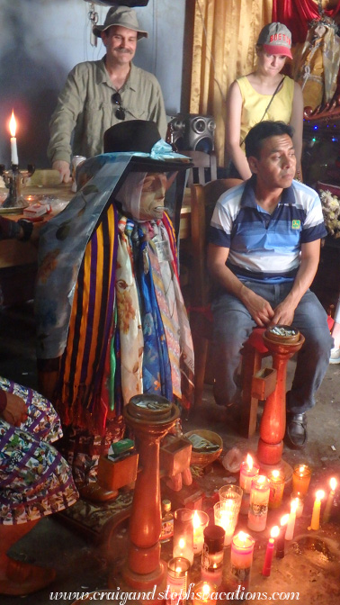 Effigy of Maximon smoking a cigarette