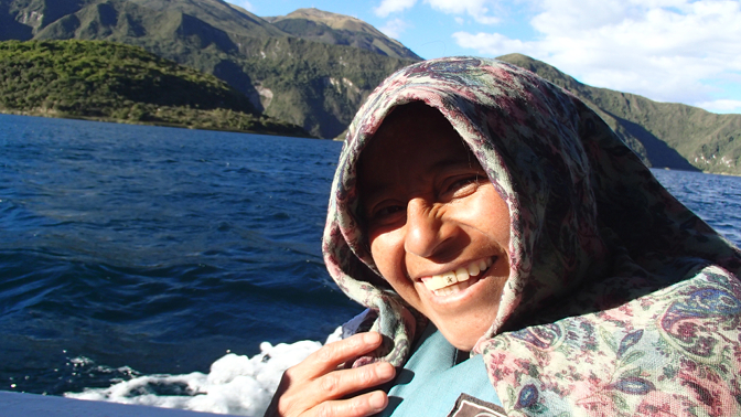 Rosa enjoying the boat ride on Lago Cuicocha for the first time since she was a child