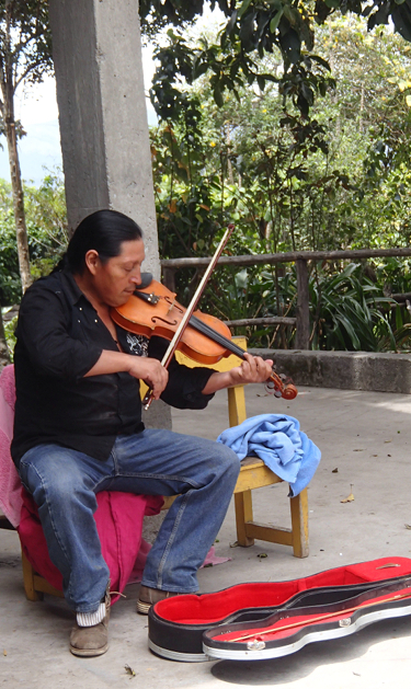 Antonio practices his fiddle