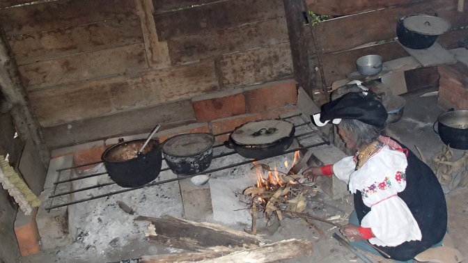 Abuelita cooking in her outdoor kitchen