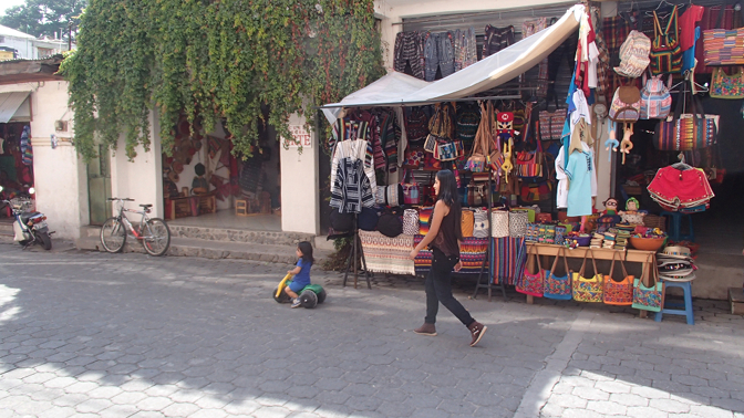 Vanesa accompanies Ian down Calle Santander to Sarita