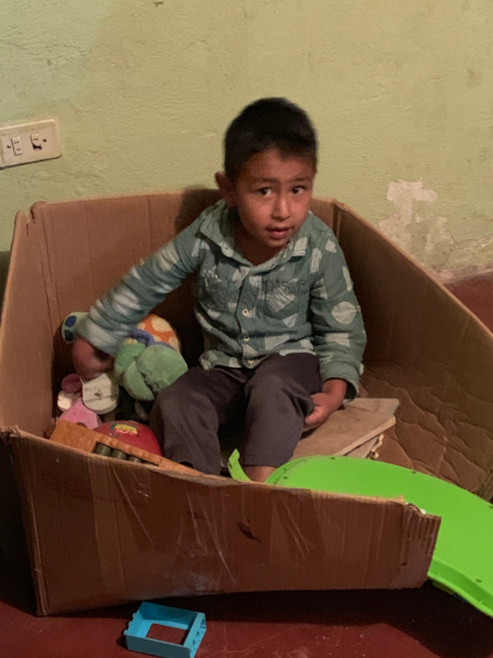 Ian Ivan in his toy box