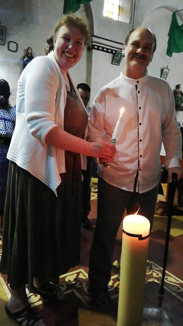 Lighting Ian Ivan's baptismal candle