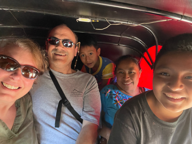 Crammed into a tuk-tuk to go to the market