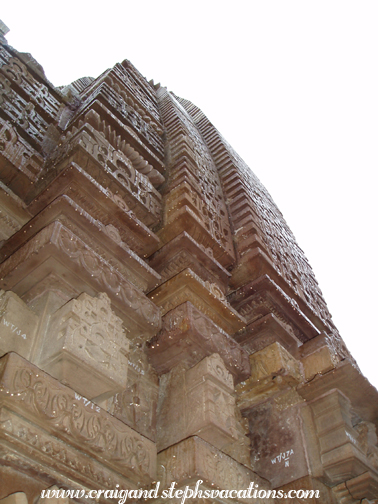 Rain drips off of a sikhara at Khajuraho