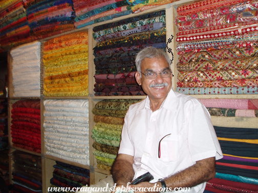 Mukul among the textiles next to Krishna Boulangerie