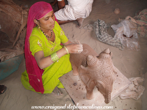 Mrs. Achlaram demonstrating terra cotta techniques