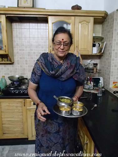 Sunita serves lunch