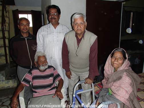 Tea at Ankush's house: Ankush, the holy man, a distant relative,  and Ankush's parents (foreground)