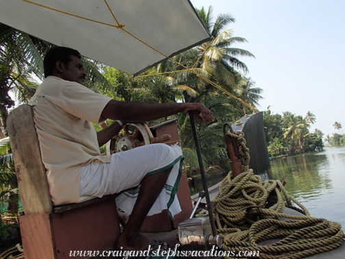 Jimon drives the houseboat