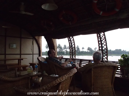 Craig and Mukul chatting on the houseboat