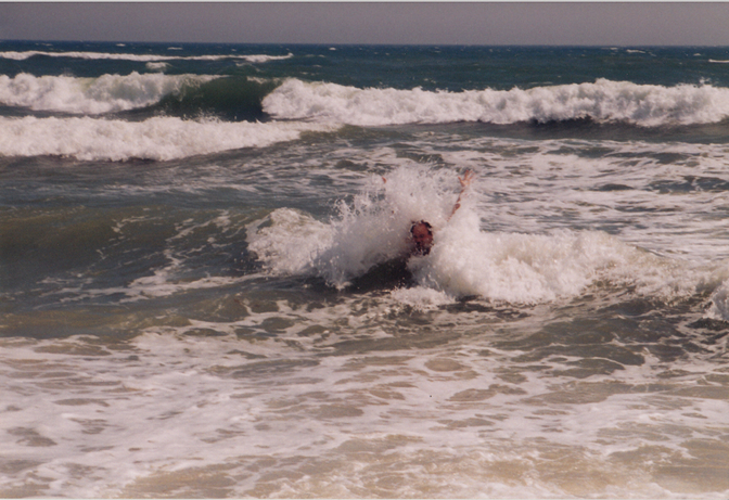 Craig plays in the waves at South Beach