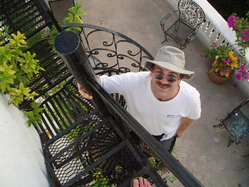 Craig descending our narrow spiral staircase, Luz en Yucatan