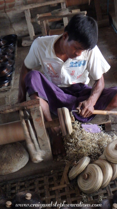 Smoothing a lacquerware form with a lathe