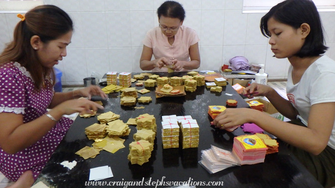 Women packaging gold leaf, King Galon Gold Leaf Workshop