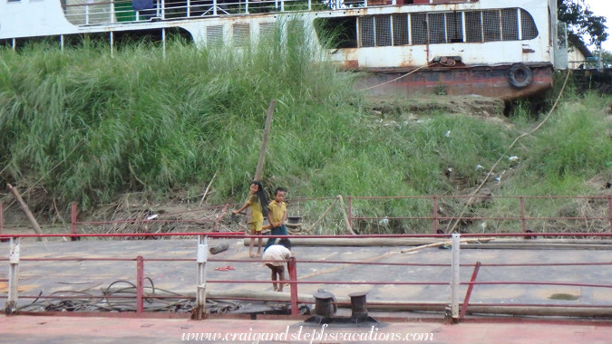 Kids playing on a barge