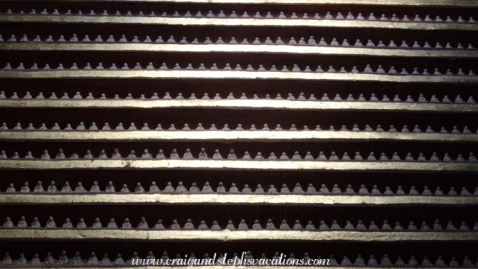 Every surface in Thanboddhay Pagoda is lined with tiny white Buddhas