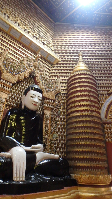 Every surface in Thanboddhay Pagoda is lined with tiny white Buddhas