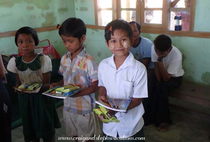 Passing out school supplies at the primary school, Sa Pa Kyi Village