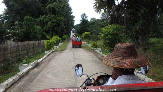 Riding in our tuk-tuk caravan to Mawlik District Administrative office