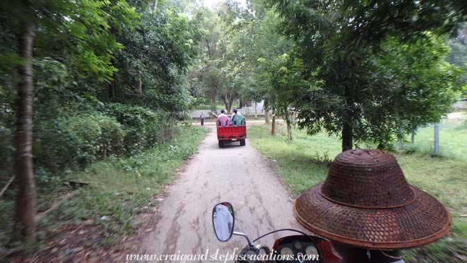 Riding in our tuk-tuk caravan to Maw Laik golf course