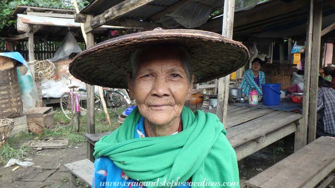 Friendly elderly woman at the market