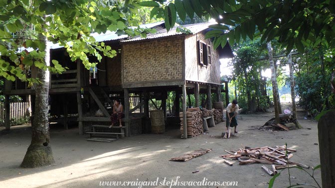 Man splitting wood, Shwe Lat Pan Village