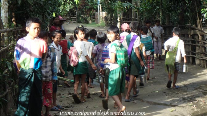 Schoolchildren walking home, Shwe Lat Pan Village