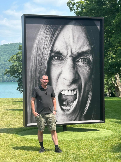 Tyson with Marc Hom's portrait of Iggy Pop