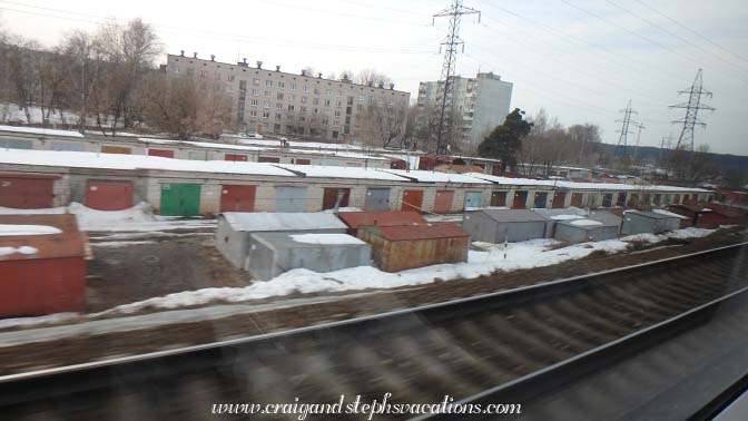 Garages by the railroad tracks