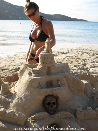 Carol works on the sand castle