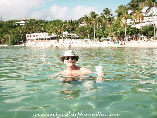 Craig floating with a drink