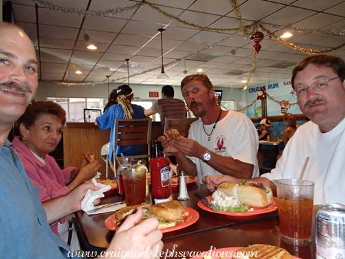 Craig, Mom, Marty, and Steve eating lunch at the Delly Deck